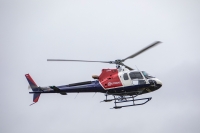 Et helikopter fra Helitrans avbildet over Lillestrøm i juni 2020.